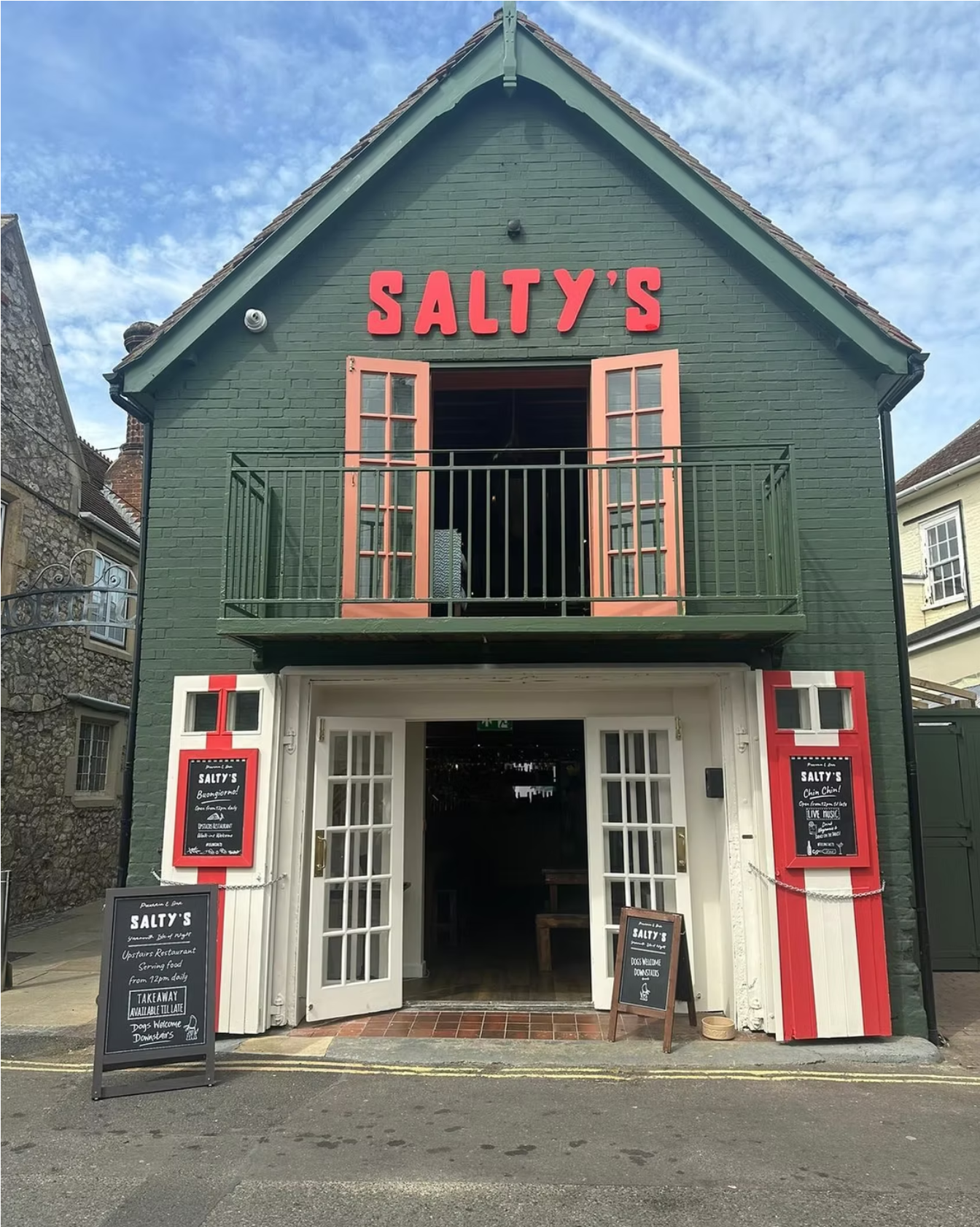 Green building with Salty's on the front