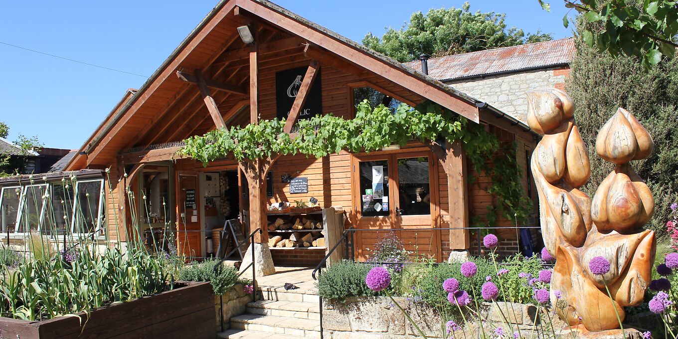 The front of a shop with shrubury